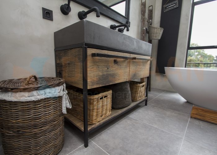 Microcement gietvloer naadloze badkamer betonlook 